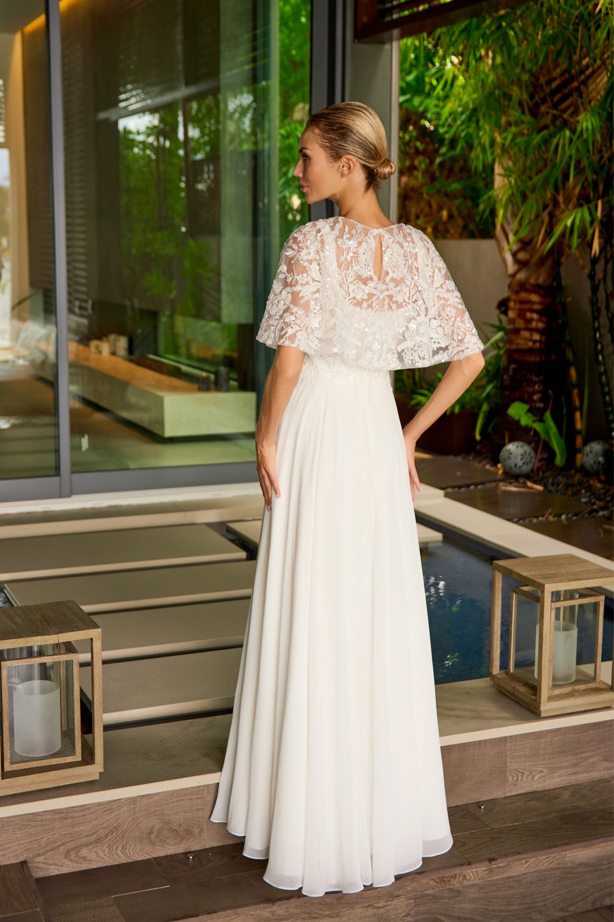 Juliet off white formal dress Style M12 at Elizabeth's Boutique in Scranton PA, back view