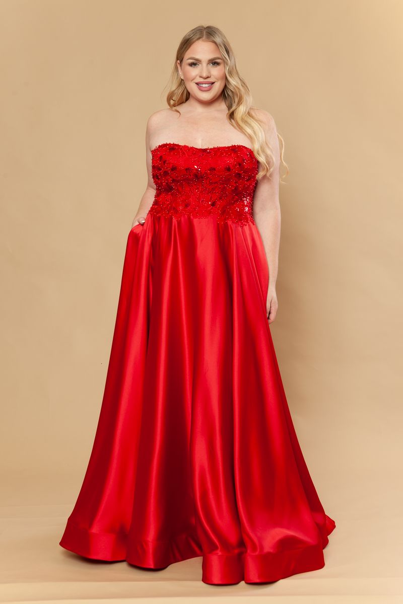 Model wearing an elegant red gown at Elizabeth's Boutique Scranton PA